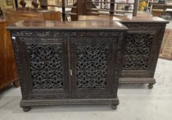 19th cent. Anglo Indian teak cabinets c1860 with carved and pierced cupboard doors and sides