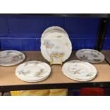 Paris porcelain hand painted plates each depicting a different hunting scene marked with impressed N