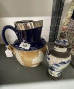 20th cent. Stoneware: Royal Doulton harvest jug with dark blue banding, hallmarked silver collar,