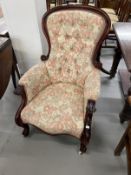 19th cent. Button back upholstered armchair, show wood top rail, carved scroll arms and cabriole