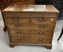 Late 18th cent. Mahogany chest of drawers, rectangular top with carved moulded edge, a brushing