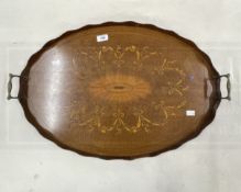 Edwardian oval inlaid tray with wavy edge gallery, brass handles, central inlaid shell surrounded by