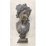 After A. Carrier bronze of a classical woman on a shaped base with ivy in her hair, signed A.