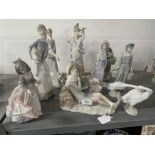 Porcelain: 20th cent. Lladro figures girl with a lamb 11ins, boy with goat 11ins, boy seated with