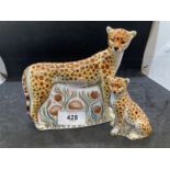 20th cent. Royal Crown Derby porcelain figures of cheetahs, one large and one small.