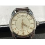 Watches: Baume ladies stainless steel cased watch with leather strap. No. 6029/1.