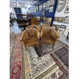20th cent. Indonesian hardwood chairs, horseshoe shaped back with open slats, slat work seats with