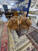 20th cent. Indonesian hardwood chairs, horseshoe shaped back with open slats, slat work seats with