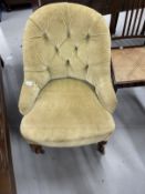Victorian upholstered button back nursing chair on cabriole front legs. 32ins. Deep x 25ins. Wide.