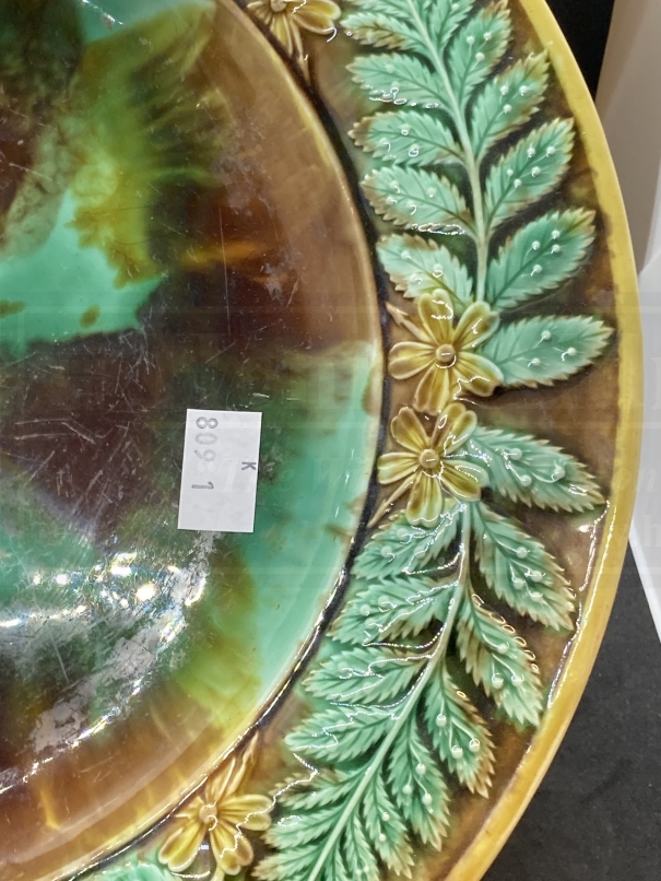 Ceramics: 19th cent. Majolica bread plate decorated with a border of leaves. 13ins. - Image 2 of 3