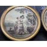 19th cent. English School: Pair of miniatures woman and children painted on silk in round brass