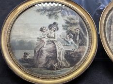 19th cent. English School: Pair of miniatures woman and children painted on silk in round brass