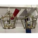 20th cent. Lighting: Pair of unglazed brass octagonal lanterns each with four lights and glass