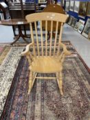 20th cent. Beech slat back rocking chair.