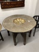 Early 20th cent. Indian brass low tray table, Jaipur ware the large tray in relief with a dense