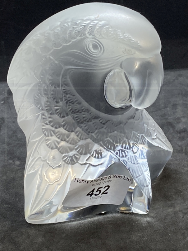 20th cent. Glass: Lalique crystal macaw parrot head paperweight. No. 118500.