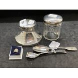 Hallmarked Silver: Silver inkwell, silver topper glass jar, silver thimble and three spoons.
