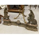 19th cent. French adjustable cast brass Griffin fireplace chevets and fender set. Height 17ins. x