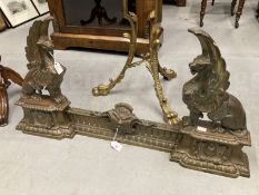 19th cent. French adjustable cast brass Griffin fireplace chevets and fender set. Height 17ins. x