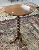 Victorian walnut tripod table by Holland & Sons c1860 the circular top inlaid with a satinwood