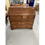 19th cent. Mahogany bureau with three long and two short drawers, fitted interior. 42ins. x 21ins. x