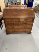 19th cent. Mahogany bureau with three long and two short drawers, fitted interior. 42ins. x 21ins. x