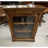 19th cent. Walnut glazed door cabinet with boxwood inlay and brass mounts to the front on a shaped