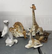 Ceramics: Russian Lomonosov figures, a seated giraffe head bent down marked Made U.S.S.R. 5½ins. x