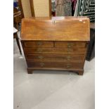 18th cent. Mahogany bureau two short over three long graduated drawers, cross banded top and fall,