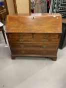 18th cent. Mahogany bureau two short over three long graduated drawers, cross banded top and fall,