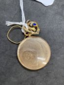 Hallmarked Gold: 22ct gold band. Weight 0.80g. Plus two yellow metal pendants, one WWI mourning