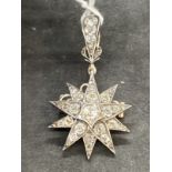 19th cent. Diamond Jewellery: Metamorphic brooch/pendant in the form of a ten pointed star, forty