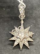 19th cent. Diamond Jewellery: Metamorphic brooch/pendant in the form of a ten pointed star, forty