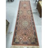 Carpets & Rugs: 20th cent. Keshan runner, red ground with stylised floral decoration and one