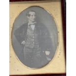 Photography: Daguerrotype 19th cent. Gentleman stood with a cane, oval mount bears label to