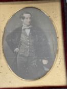 Photography: Daguerrotype 19th cent. Gentleman stood with a cane, oval mount bears label to