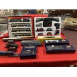 Toys: Hornby OO trains one boxed set, one cased set with tracks and various carriages, etc.