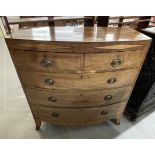 19th cent. Mahogany bow front chest of two short over three long drawers, ebony stringing, two