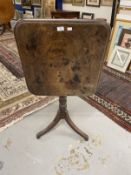 19th cent. Mahogany tilt top side table on single support.