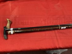 19th cent. Ebony and silver banded walking cane plus rustic example. (2)