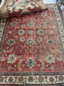 Carpets & Rugs: Early 20th cent. Persian carpet, red ground with floral decoration and seven borders