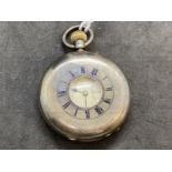 Hallmarked Silver Watches: Dent London silver half hunter pocket watch, the signed white dial with