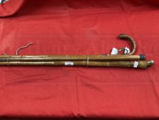 Walking Sticks: Bamboo stick with engraved 18ct gold tip, bamboo stick with silver band, silver