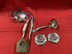 Collectables: Southern Asian white metal belt buckles depicting Kali, a quartz carving of Buddha