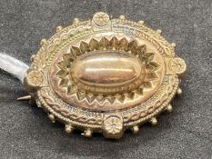 Jewellery: Edwardian yellow metal oval mourning brooch, tests as 9ct gold. Weight 5.6g.