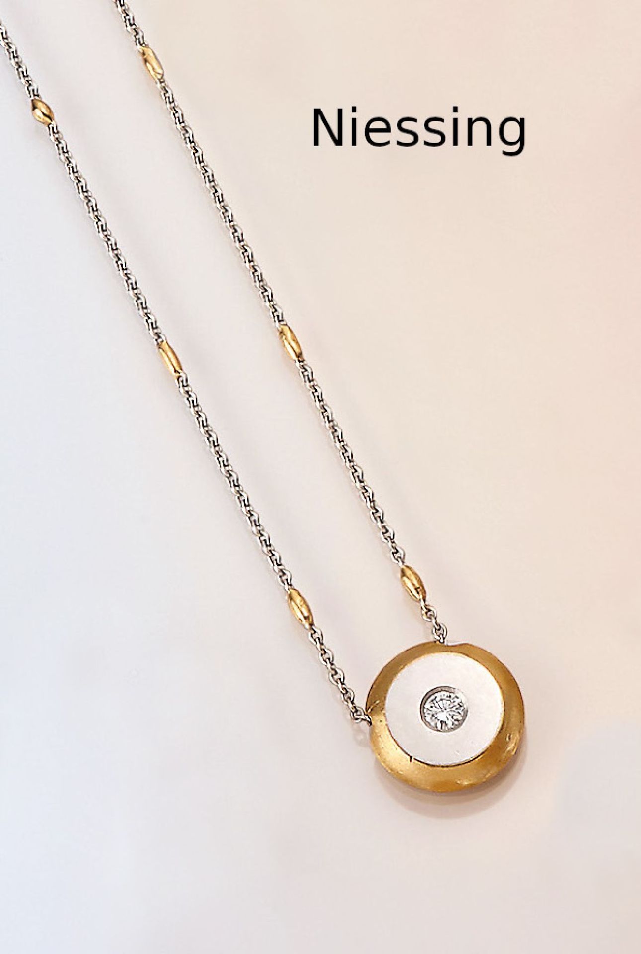 NIESSING Collier mit Brillant, Platin und GG,   Platin