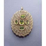 14 kt Gold Brosche/Anhänger mit Peridots, GG 585/000,