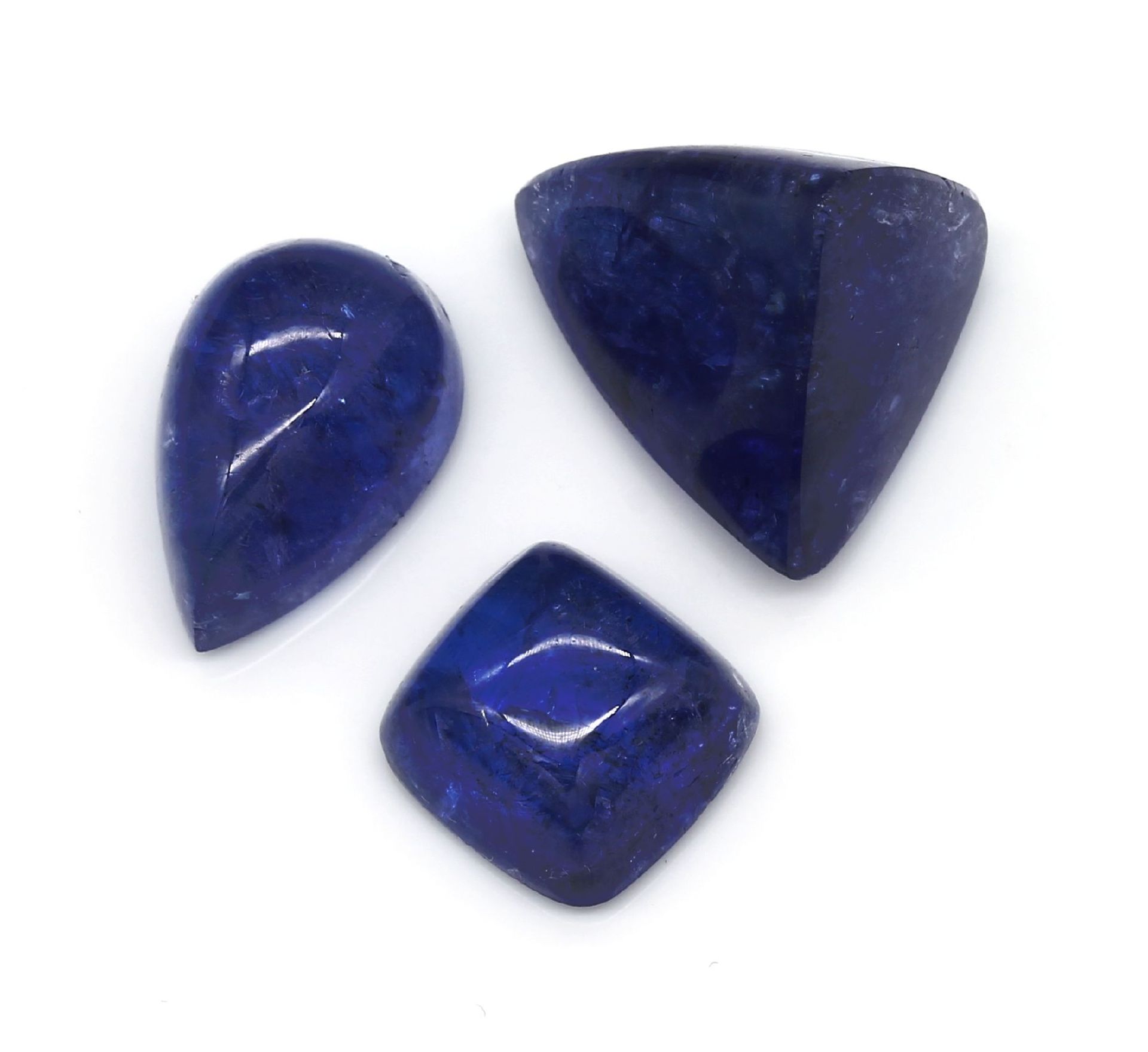 Lot lose Tansanite, zus. ca. 42.76 ct,   3 Cabochons in