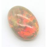 Loser Opalcabochon, ca. 14,5 ct, ca. 22 x 16 mm, rotes