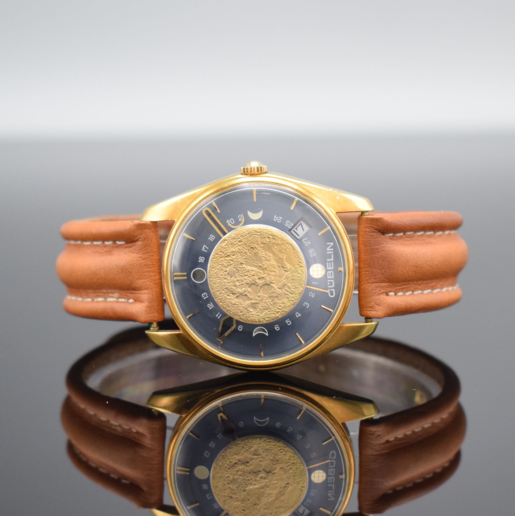 GÜBELIN seltene & ausgefallene Armbanduhr in GG 750/000,